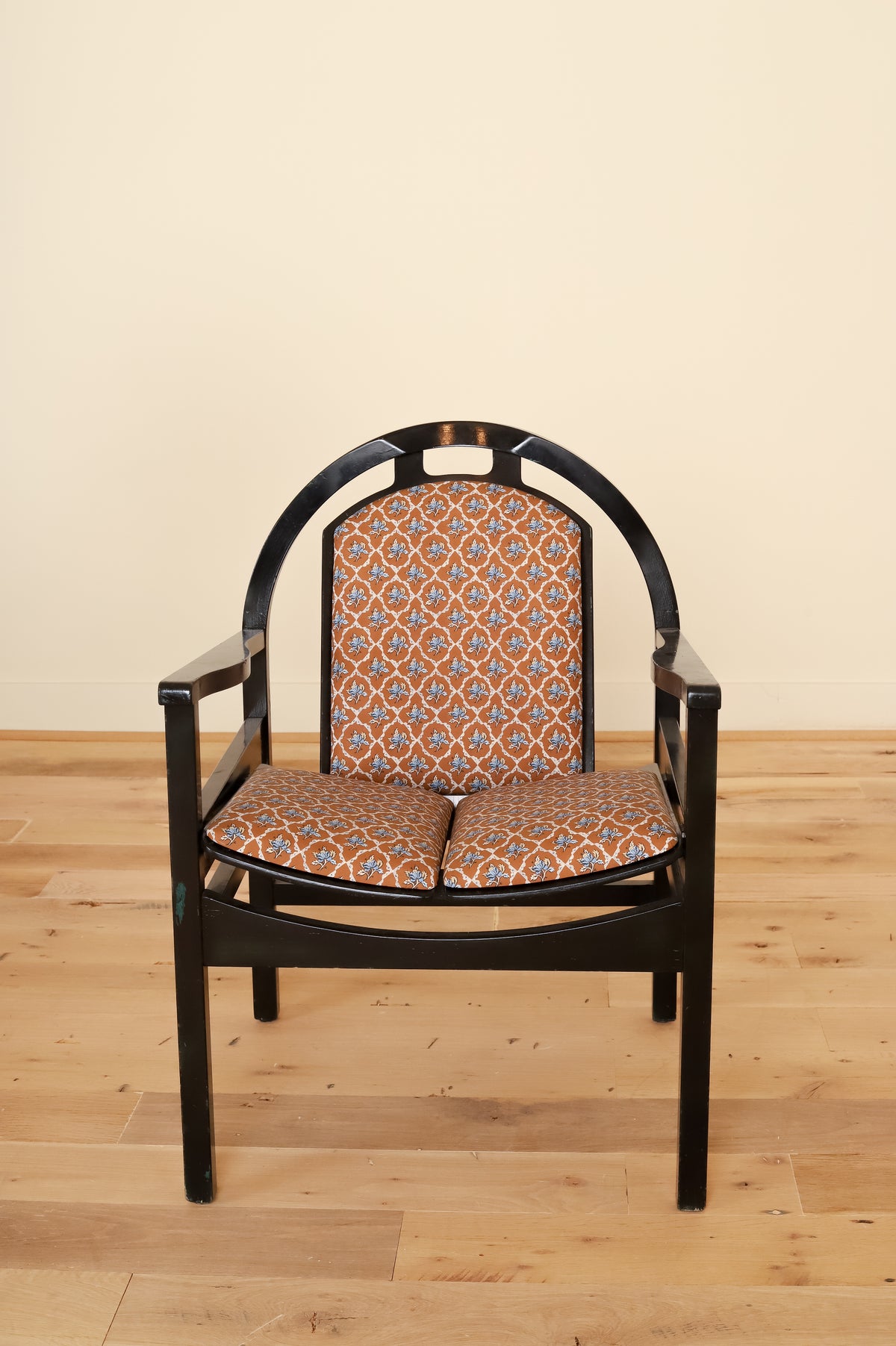 Black lacquered Baumann armchair in Leah O'Connell Textiles, front