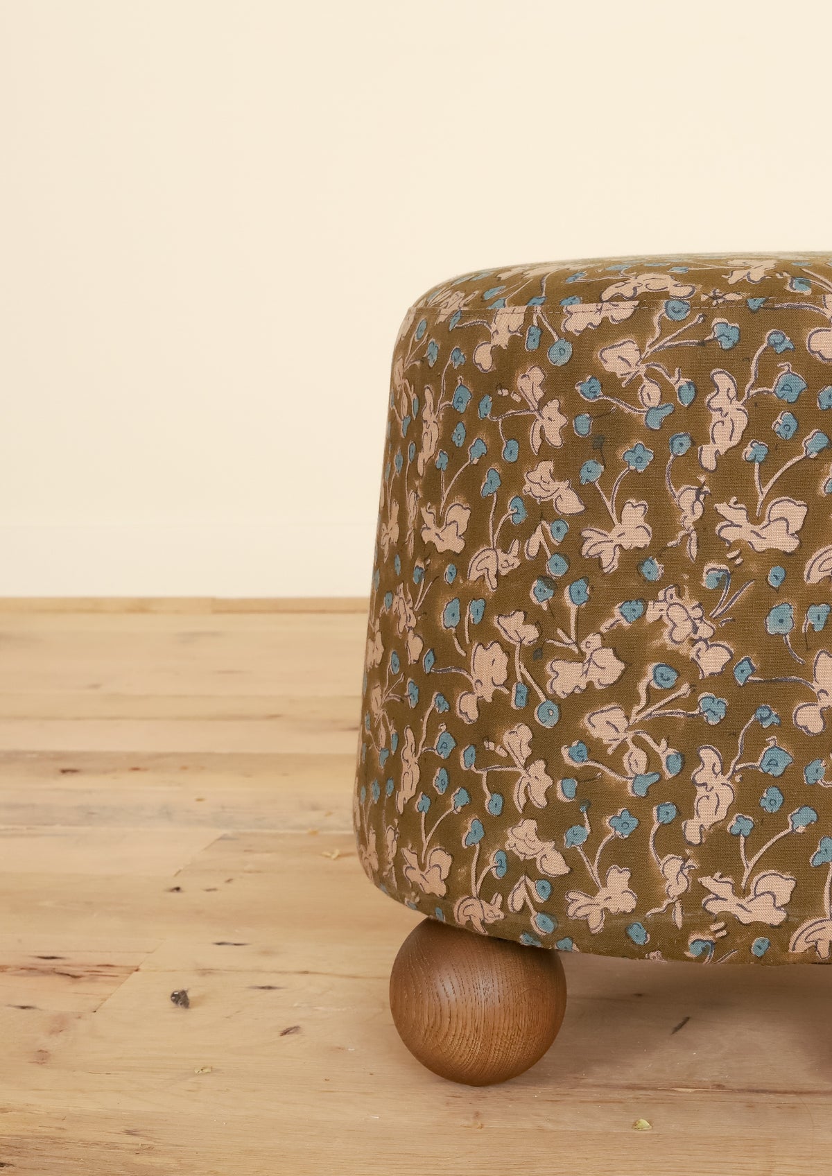 Flavia Ottoman in Allem Studio, ball foot and fabric detail