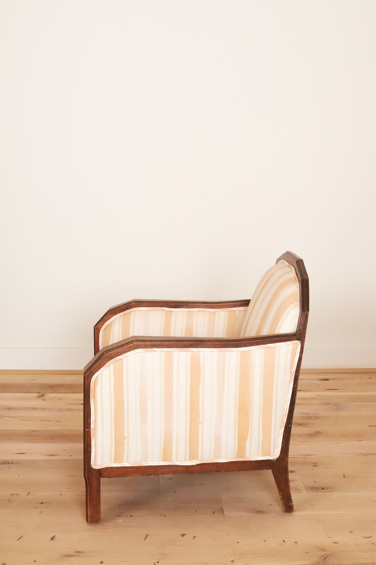 French Art Deco club chair in Work + Sea terracotta ticking, side