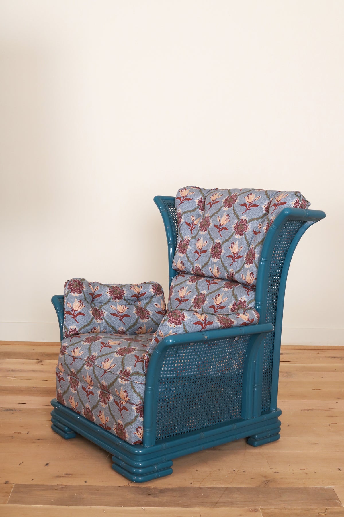 Pair of Italian bamboo framed wing armchairs in Leah O'Connell Astrid, Mulberry, three-quarter view