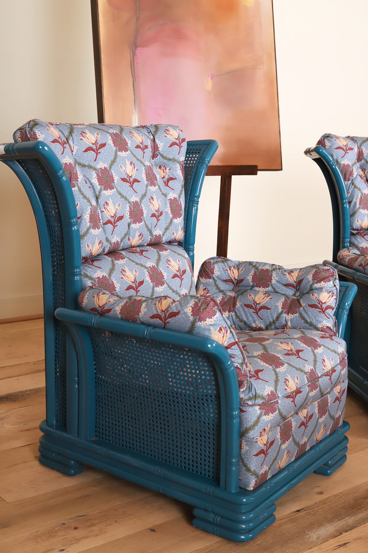 Pair of Italian bamboo framed wing armchairs in Leah O'Connell Astrid, Mulberry, three-quarter view