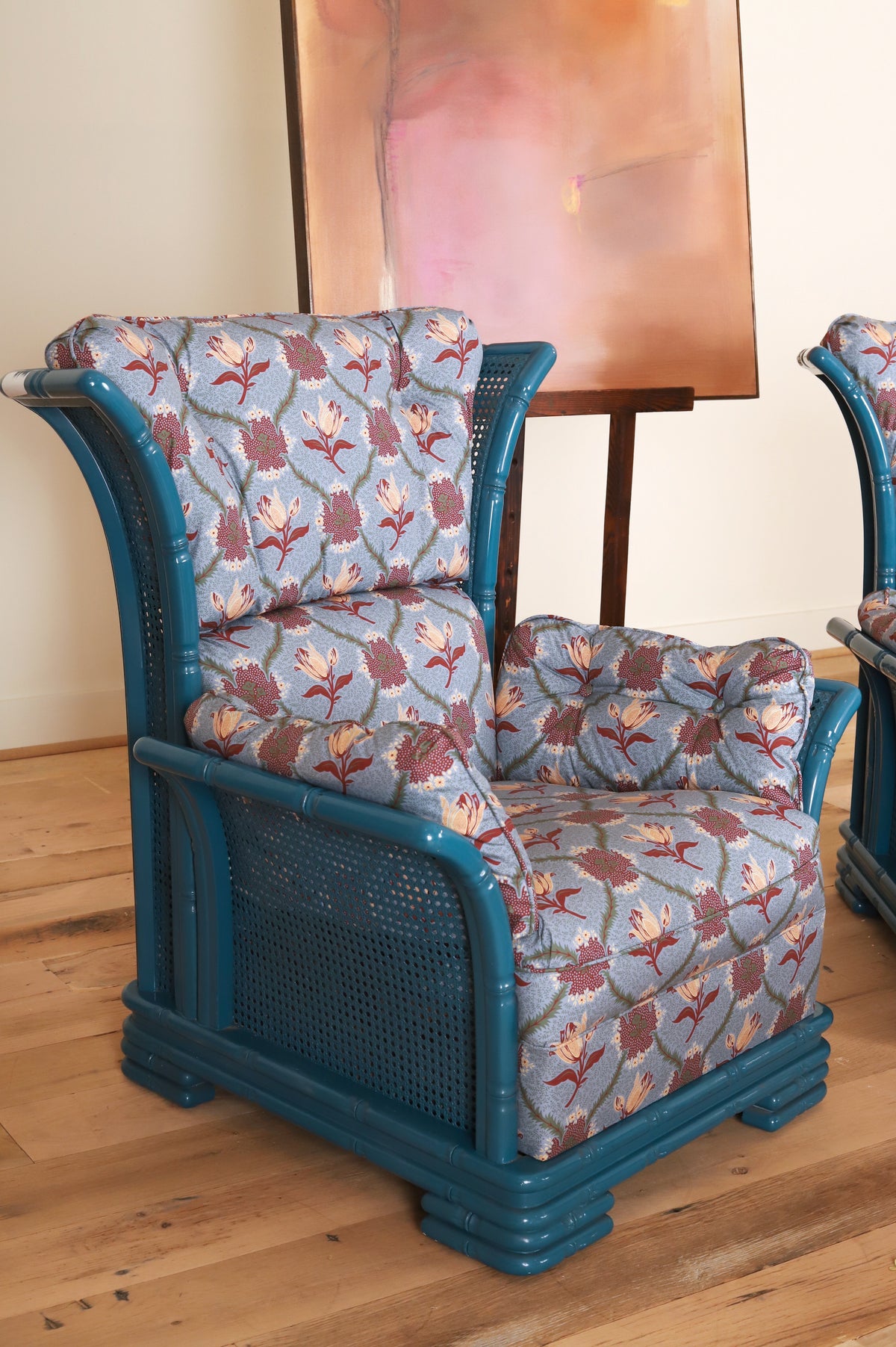 Pair of Italian bamboo framed wing armchairs in Leah O'Connell Astrid, Mulberry, three-quarter view
