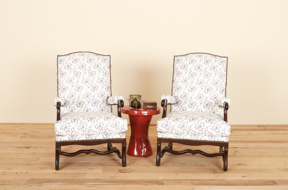Pair of Louis XIII os-de-mouton armchairs in Fete Home by Jen Potter, styled