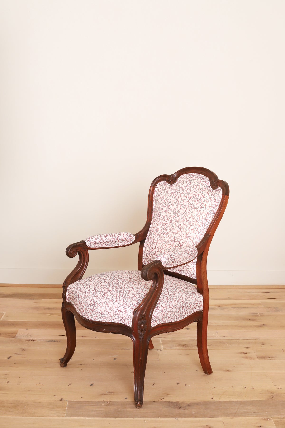 Pair of carved walnut Louis XV style armchairs in Quercus & Co Bower, Damson, three-quarter view