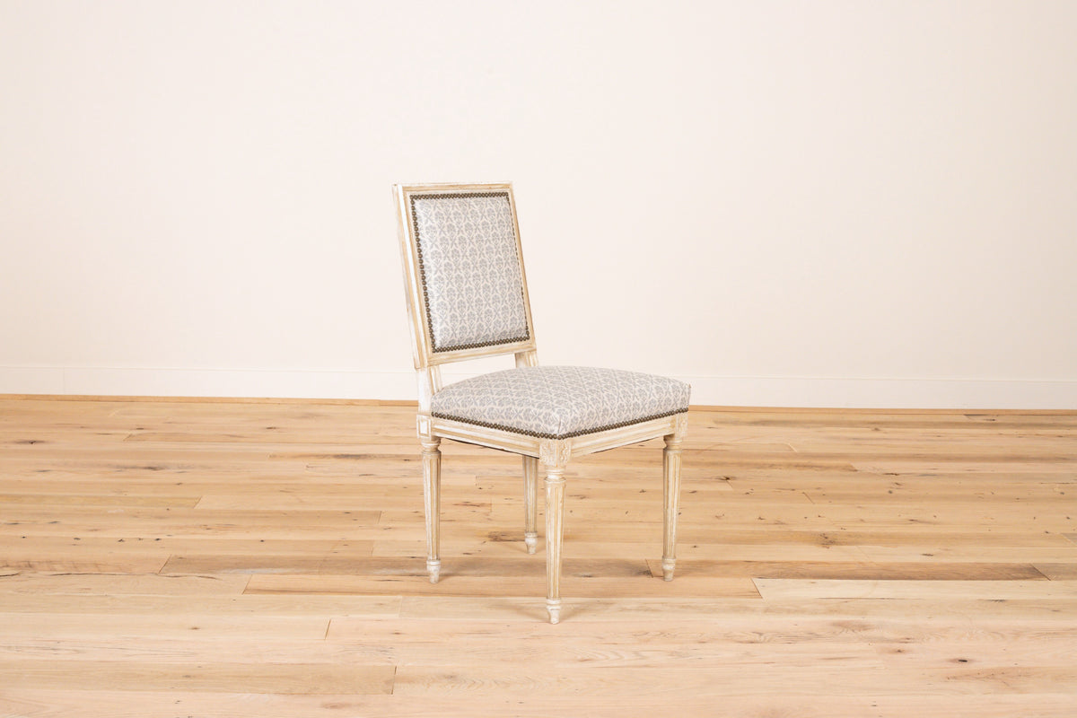 Louis XVI style chair in Marika Meyer Hollyhock, Light Blue on Oatmeal Linen, three-quarter view