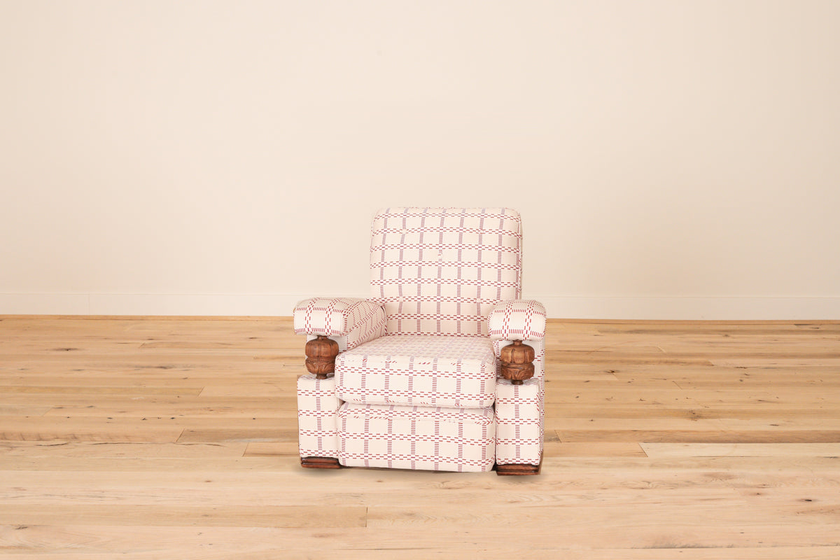 French club chair c. 1960 with carved wood arm supports in Mally Skok Nantucket, front view on a wood floor