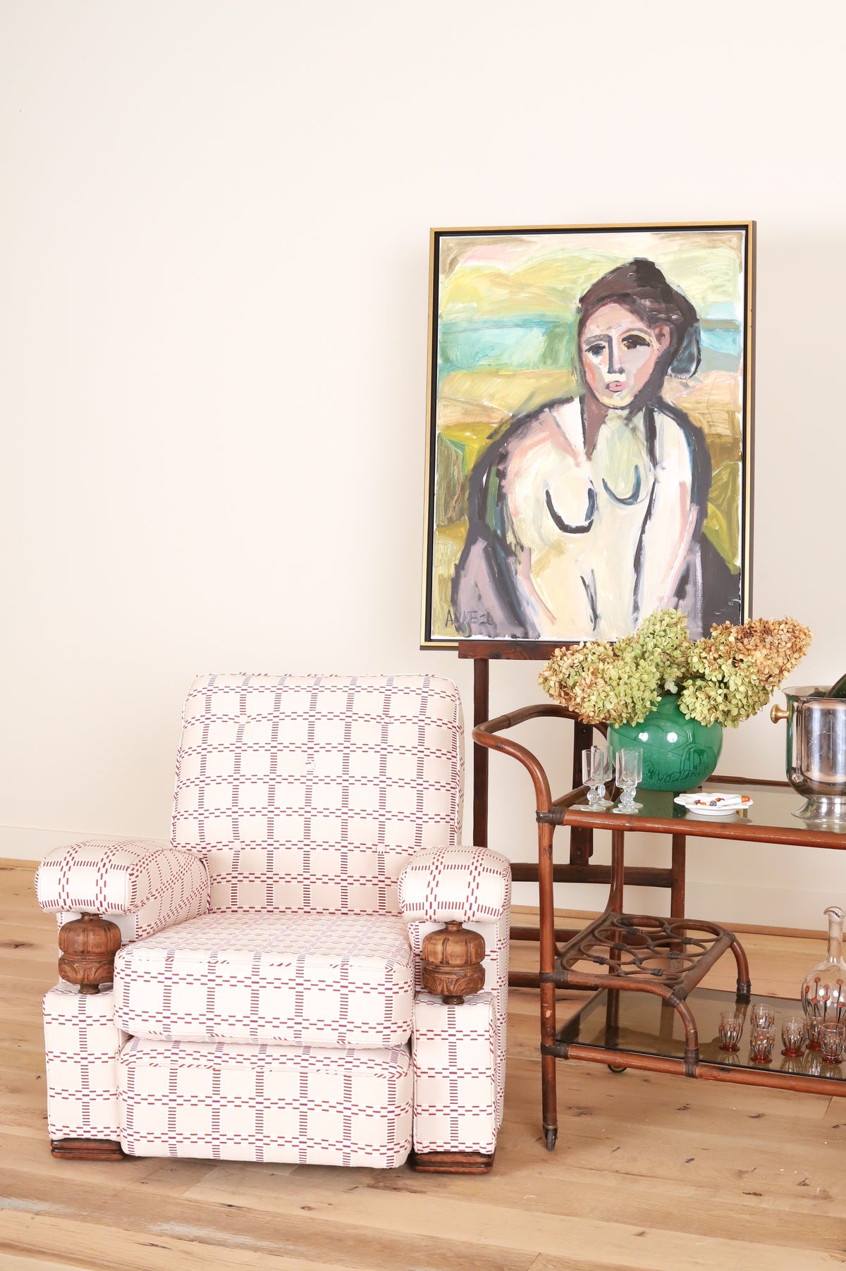 French club chair in Mally Skok Nantucket, styled with a bamboo bar cart