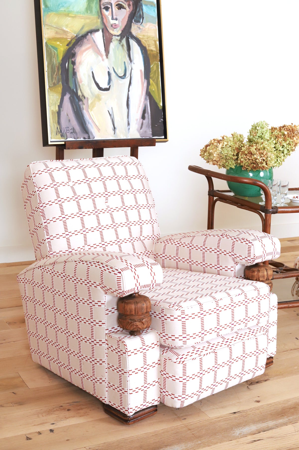 French club chair with carved wood arm supports, three-quarter view