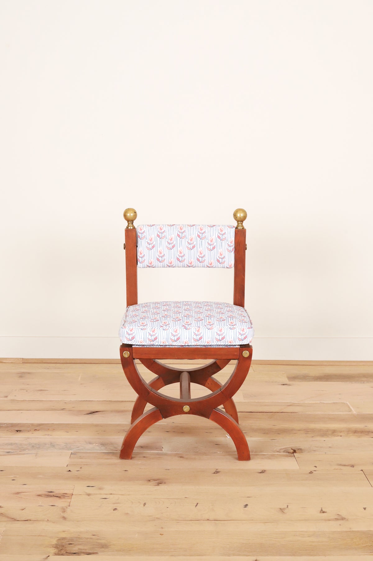 Set of four Spanish Art Deco chairs with brass ball finials in Kate Medlicott Odette, front