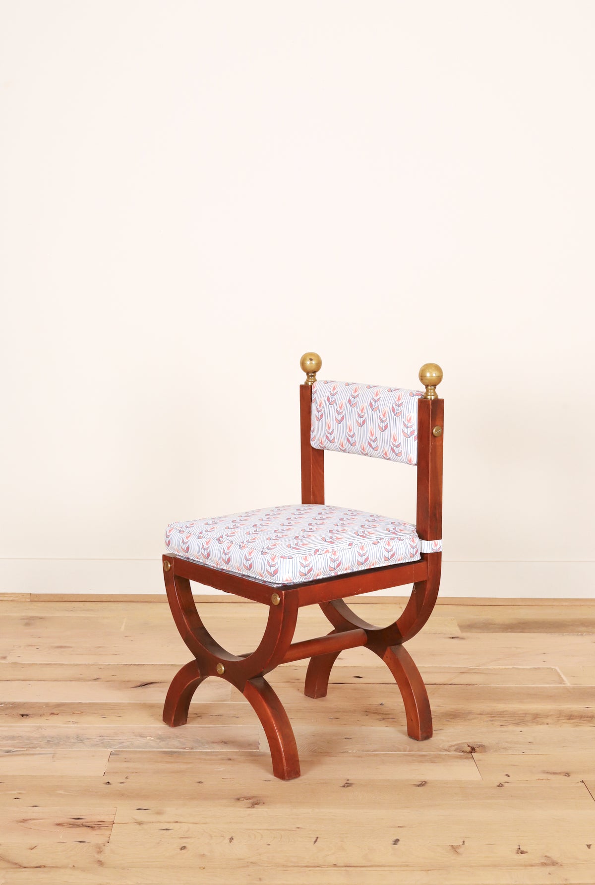 Set of four Spanish Art Deco chairs with brass ball finials in Kate Medlicott Odette, three-quarter view