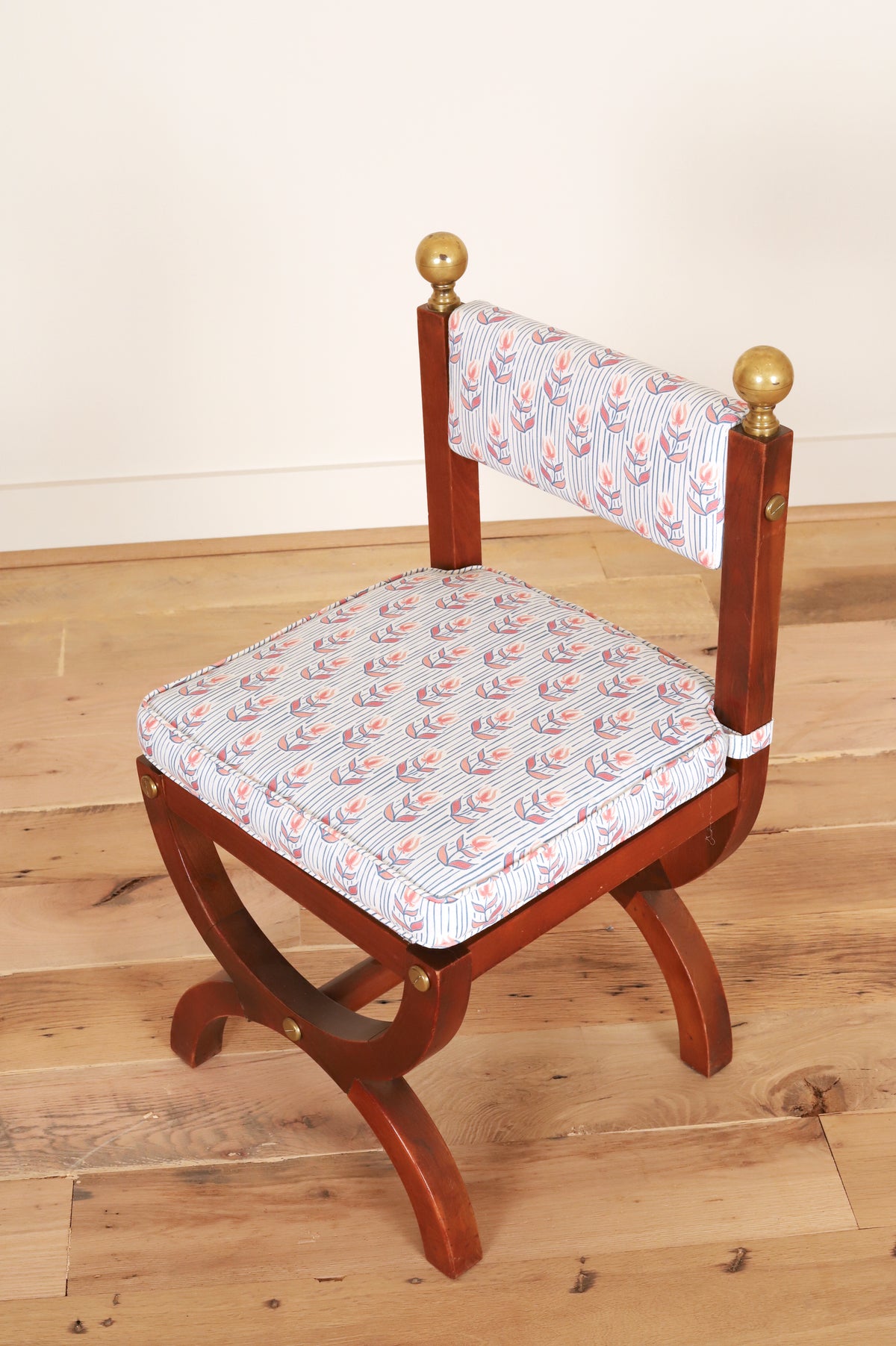 Set of four Spanish Art Deco chairs with brass ball finials in Kate Medlicott Odette, three-quarter view