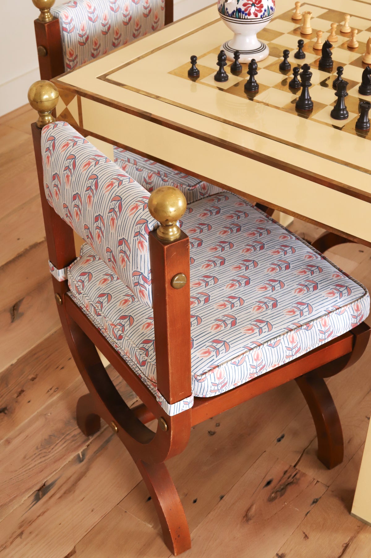 Set of four Spanish Art Deco chairs with brass ball finials in Kate Medlicott Odette, at the game table